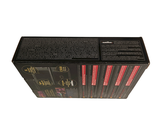 an image of a black box with red and black writing on it