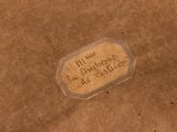 an old picture of a piece of paper with a label on it