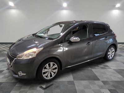 a picture of a gray car parked in a garage