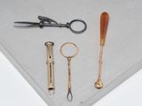 a pair of scissors, a pair of scissors and a pair of scissors on a table