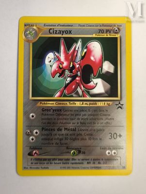 a close up of a pokemon card on a white surface