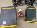 a box of engine oil next to a canister of engine oil
