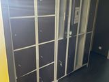 several lockers in the hallway of a building