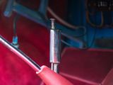 a red handle that is attached to a red handle