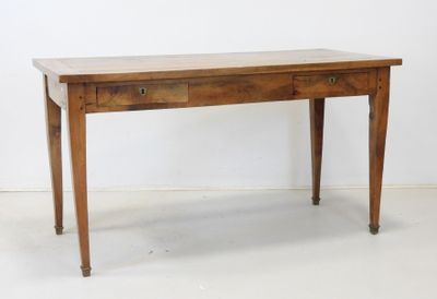 a small wooden table with two drawers on it