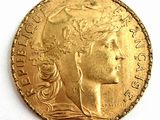 l'image d'une pièce d'or sur laquelle figure une tête de femme