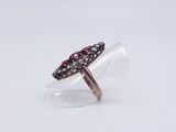 a close up of a ring on a clear surface with a white background