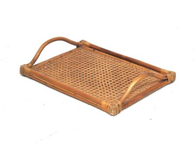 a small rattan tray with a handle on a white background