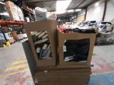 two boxes that are stacked on top of each other in a warehouse