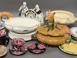many different types of dishes and bowls on the table