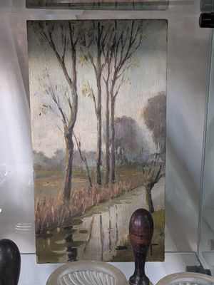 une image d'une peinture exposée dans une vitrine