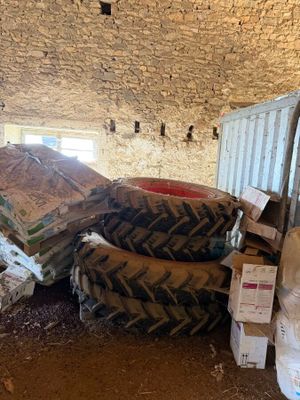 a pile of tires sitting in the middle of a room