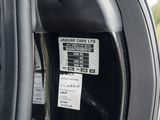 a close up of a car ' s parking meter with a sticker on it