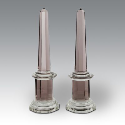 pair of pink glass candlesticks on clear bases