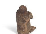an image of a statue of a man with a hat on his head