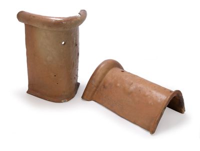 pair of terracotton vases on a white background