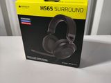 a box with a pair of headphones sitting on top of it