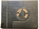 an old book with a picture of a sailboat on it