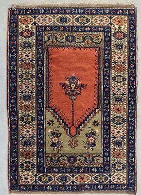 Tapis en laine à décor de suspension sur fond rouge, bordure…