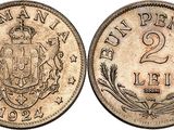 a coin with a coat of arms and a crown on it