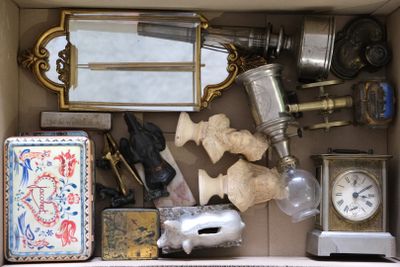a box filled with assorted items and a clock
