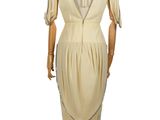 an image of a dress on a mannequin stand