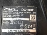 a close up of a car ' s battery with a sticker on it