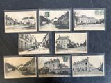several old black and white photographs of a town street