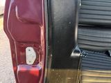 an image of a car with the back door open
