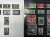 two different types of stamps displayed on the wall