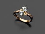 une bague en or sertie d'une topaze bleue et de diamants