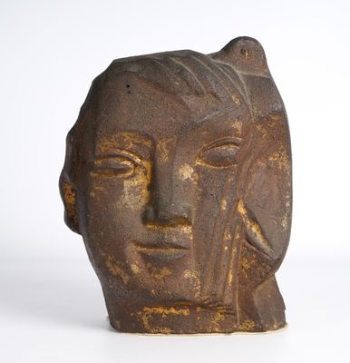 an image of a sculpture of a woman ' s face