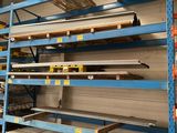 a large rack with several shelves in a warehouse