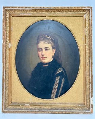 portrait of a woman in a black dress with a gold frame