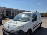 a picture of a white van parked in a parking lot