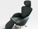 an image of a black leather recliner chair with a foot rest