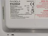 a close up of a microwave with a label on it