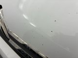 a close up of a car ' s front bumper