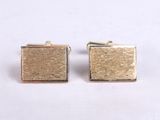 gold plated square cufflinks with a textured surface