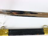 two swords that are on display on a table