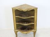 an image of a corner cabinet with three shelves on top of it