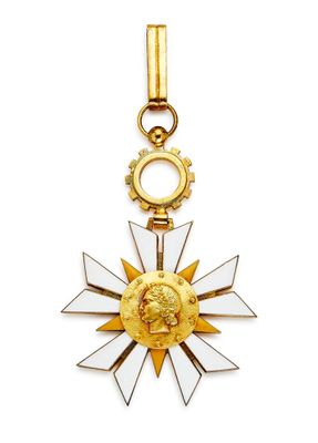 une image représentant une médaille d'or ornée d'une étoile
