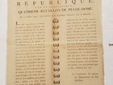 un vieux journal français sur lequel figure une liste d'articles