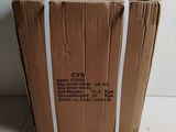 an open cardboard box sitting on top of a floor next to a white wall