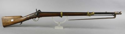 an old rifle with a wooden barrel and a wooden case