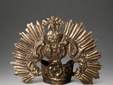a gold crown with a crown on top of it