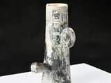 a vase that is sitting on a white table