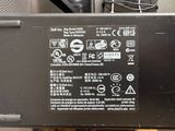 an image of a laptop with a battery on top of it