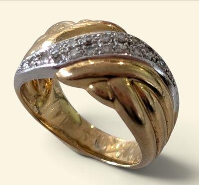 an image of a gold and silver ring with diamonds