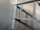 a ladder that is leaning against a wall